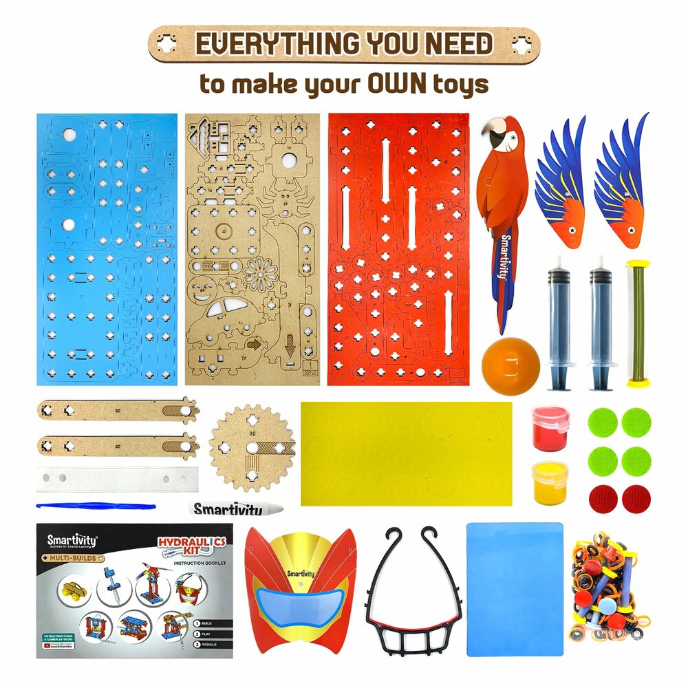 Smartivity Hydraulisch Bouwavontuur onderdelen en handleiding op tafel